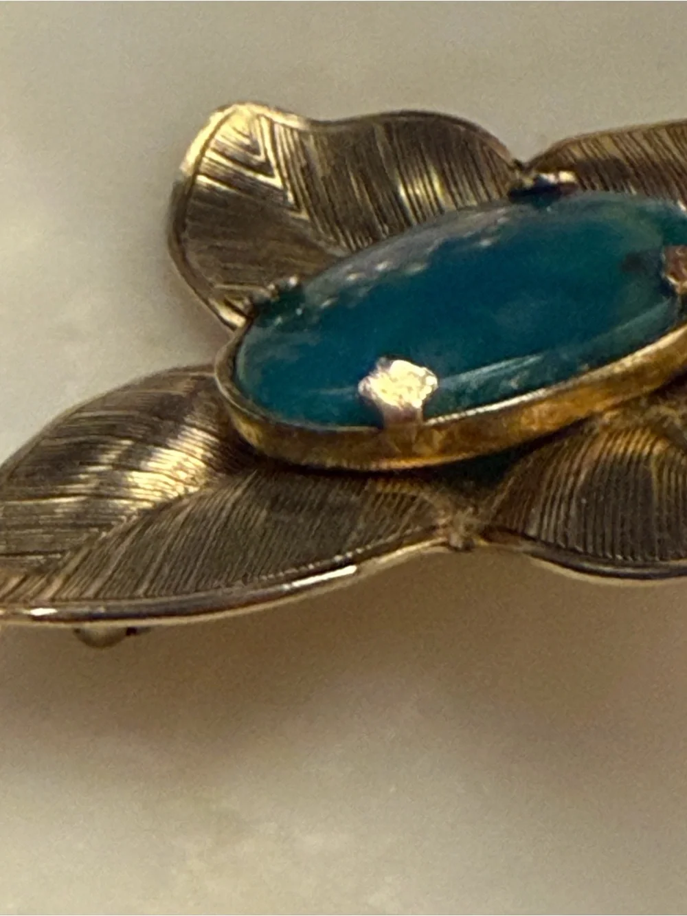 Silver tone leaf brooch with‎ blue cabochon stone pin